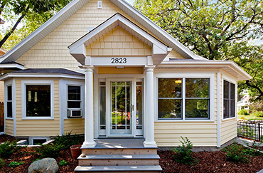 Front-entry porch and heated-entry porch were added to this turn-of-the-century classic.