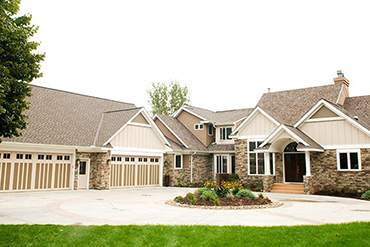 Garage addition and exterior enhancements to the entire home.